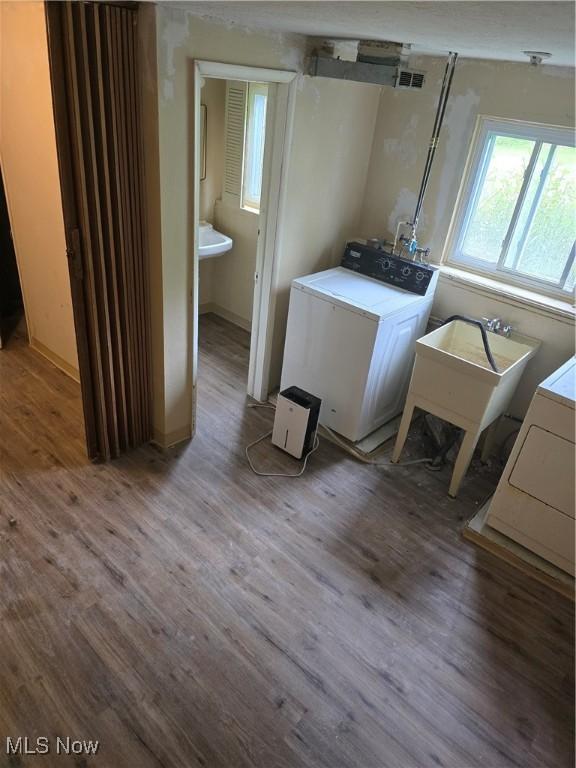 3742 Concord Dr, Beachwood, OH 44122 - laundry area featuring wood finished floors