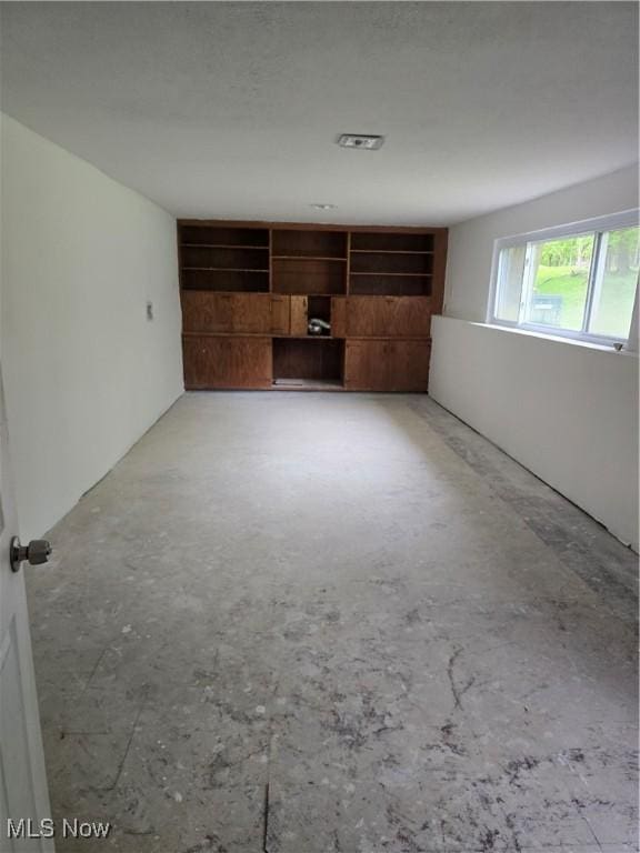 3742 Concord Dr, Beachwood, OH 44122 - unfurnished room featuring unfinished concrete flooring