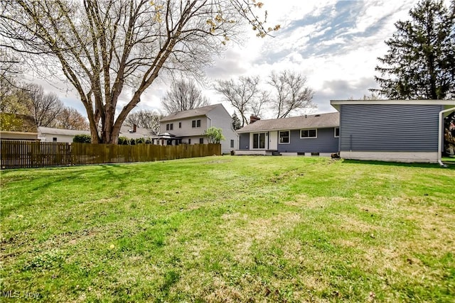 view of yard with fence