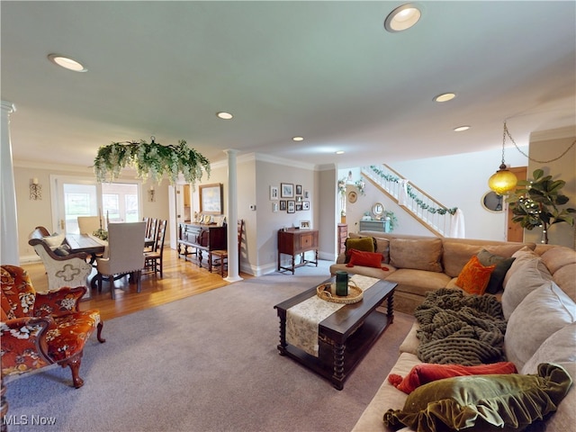 living room featuring ornate columns, ornamental molding, recessed lighting, carpet, and baseboards