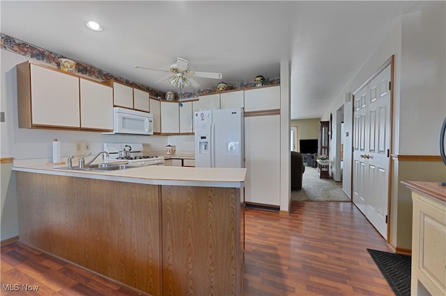 810 Southwestern Run Unit 19, Poland, OH 44514 - kitchen featuring a sink, ceiling fan, light countertops, white appliances, and a peninsula