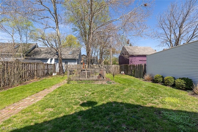 view of yard featuring a fenced backyard