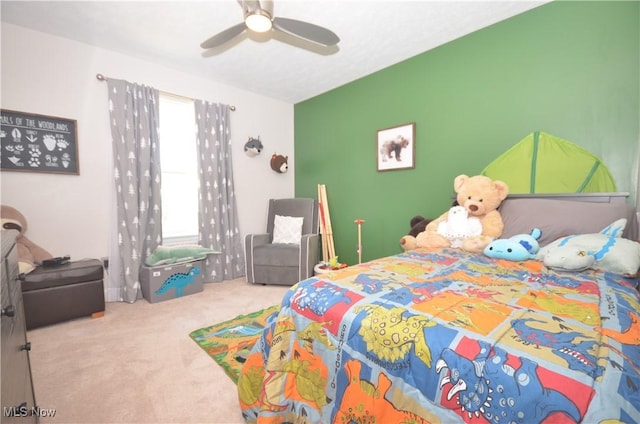 bedroom featuring carpet and a ceiling fan