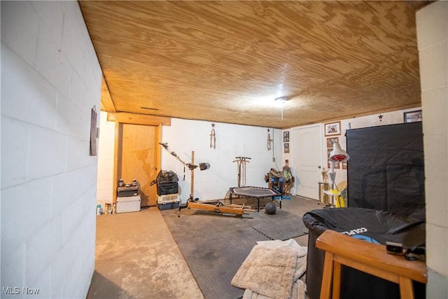 workout room with concrete block wall