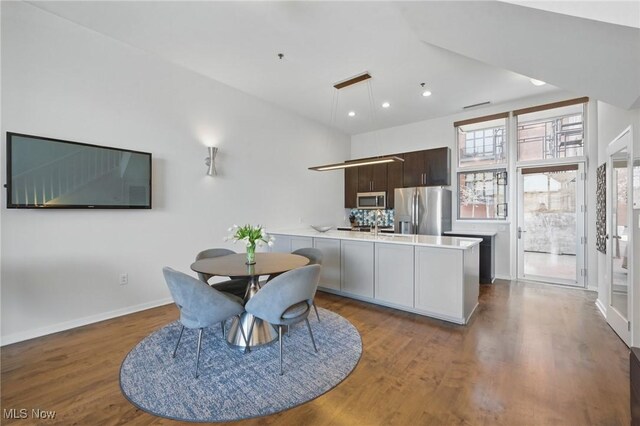 1951 W 26th St Unit Th5, Cleveland, OH 44113 - dining space featuring wood finished floors, baseboards, and recessed lighting