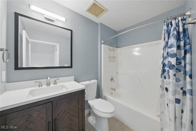 1951 W 26th St Unit Th5, Cleveland, OH 44113 - full bathroom with shower / bath combo, vanity, toilet, and tile patterned flooring