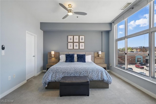 1951 W 26th St Unit Th5, Cleveland, OH 44113 - bedroom with carpet flooring, baseboards, and ceiling fan