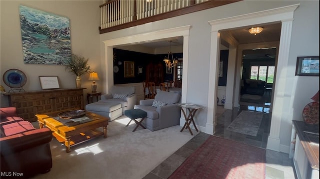 living room with a notable chandelier