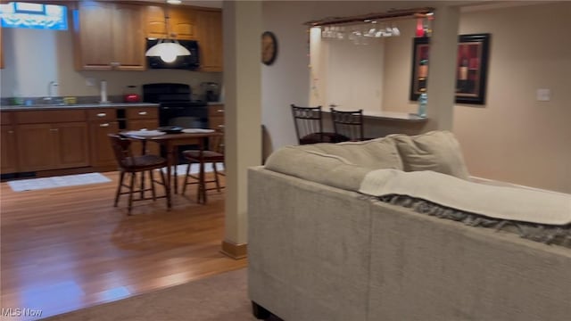 living area featuring light wood-style flooring