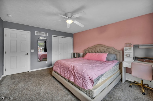 bedroom featuring carpet floors, a closet, ceiling fan, baseboards, and visible vents