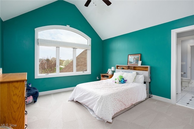 bedroom with carpet, a ceiling fan, lofted ceiling, and baseboards