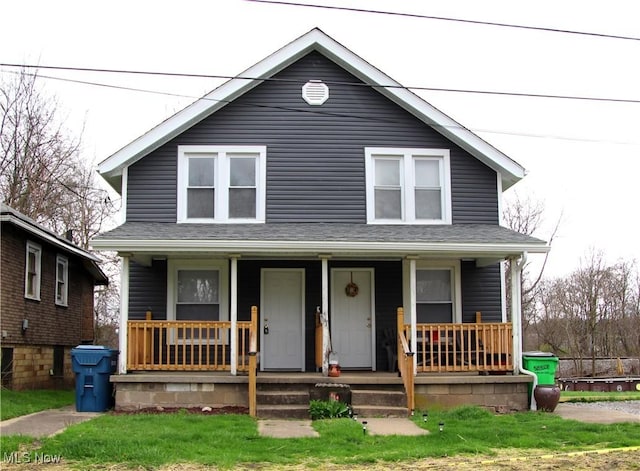 1024 Cleveland St SW, Massillon, OH 44647 - view of front of home featuring a porch and roof with shingles