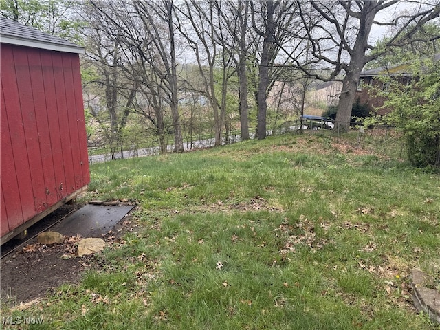 view of yard with fence