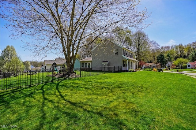 view of yard with fence