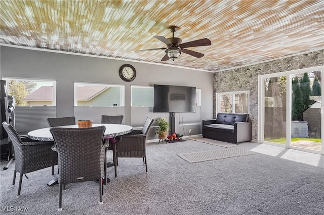 sunroom / solarium featuring plenty of natural light