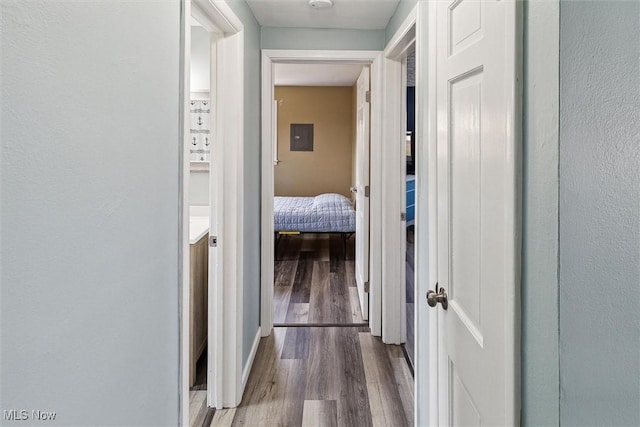 hallway with wood finished floors