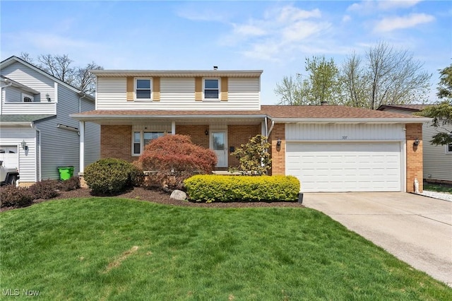 traditional-style home with driveway, a garage, brick siding, a front lawn, and a shingled roof