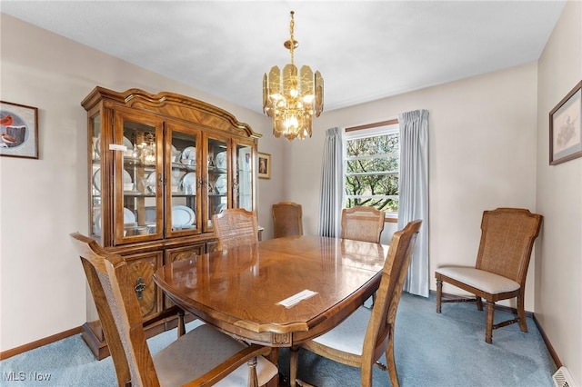 dining area featuring an inviting chandelier, baseboards, and carpet