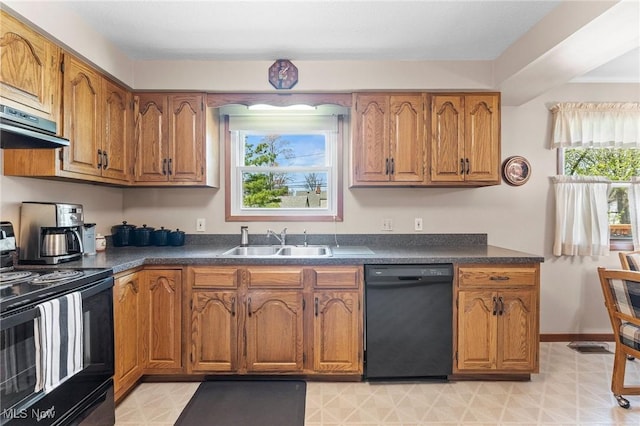 kitchen with a sink, range hood, black appliances, and brown cabinets