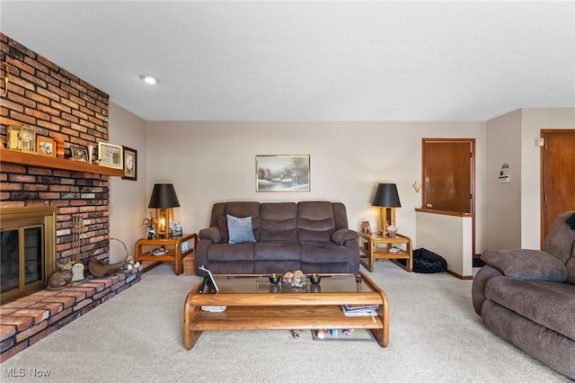 carpeted living room with a fireplace