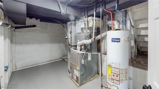utility room featuring water heater