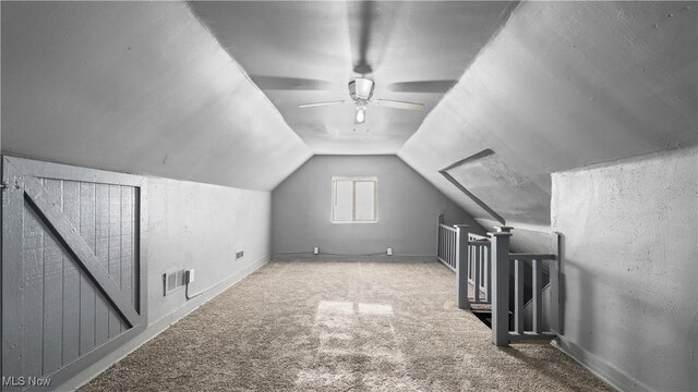 636-638 Fern St, Akron, OH 44307 - additional living space with a ceiling fan, carpet floors, vaulted ceiling, and baseboards