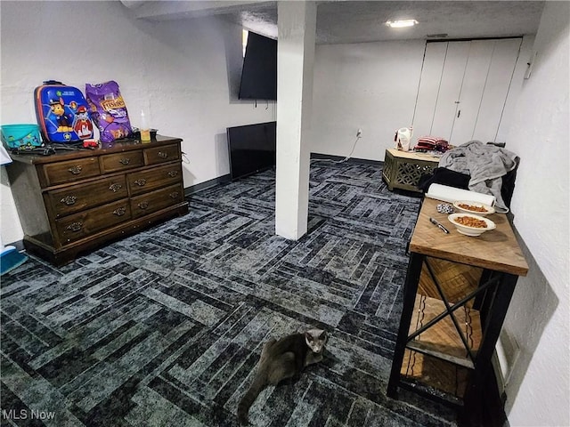 finished basement with carpet flooring