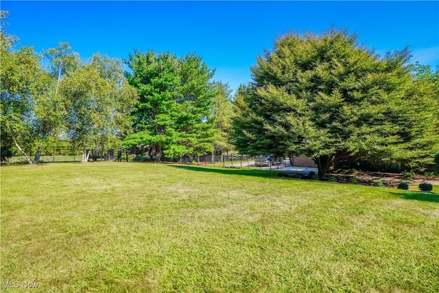 view of yard featuring fence