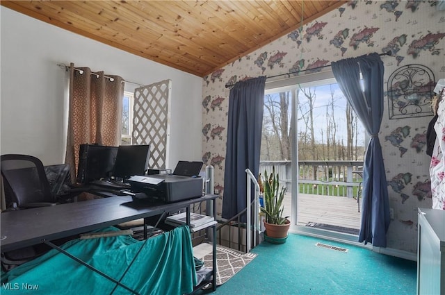 carpeted office with visible vents, baseboards, wood ceiling, wallpapered walls, and lofted ceiling