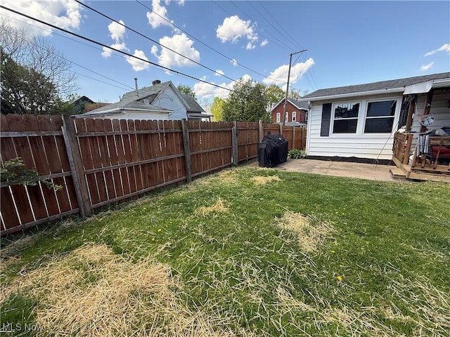 view of yard with a patio and a fenced backyard