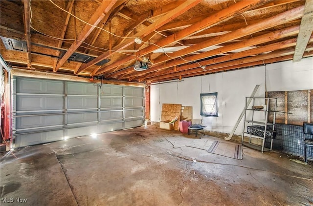 garage featuring a garage door opener