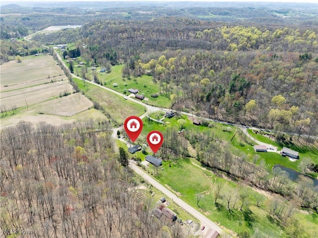 1966 Tall Timber Rd NE, New Philadelphia, OH 44663 - drone / aerial view featuring a rural view and a view of trees