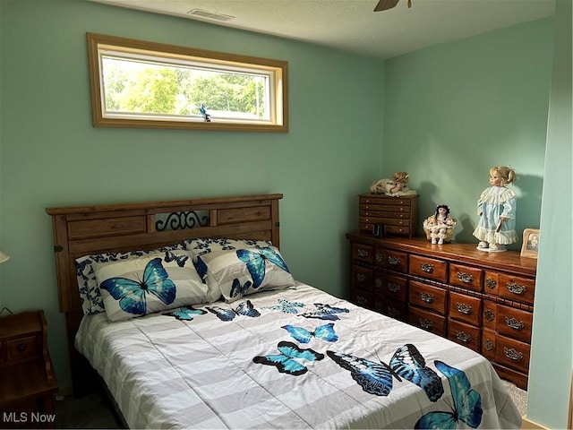 1966 Tall Timber Rd NE, New Philadelphia, OH 44663 - bedroom featuring visible vents and ceiling fan