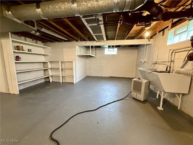 basement featuring a sink