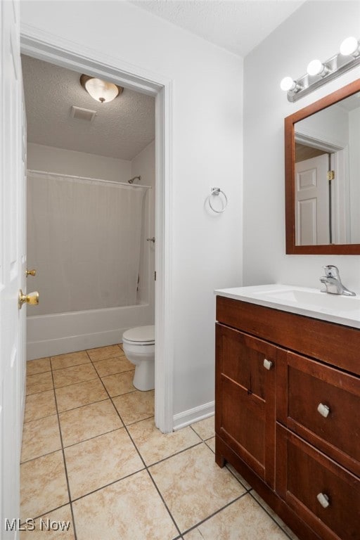 full bath with tile patterned flooring, toilet, shower / bath combination, vanity, and a textured ceiling