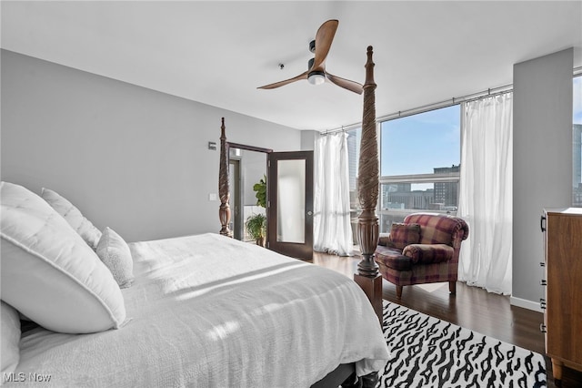 bedroom with wood finished floors and ceiling fan
