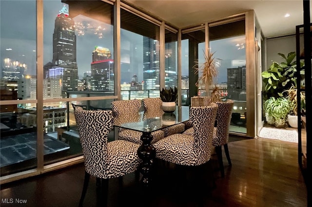 sunroom featuring a view of city