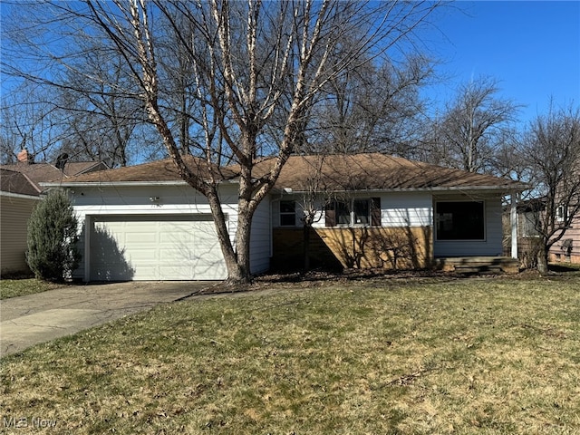 ranch-style home with driveway, an attached garage, and a front lawn
