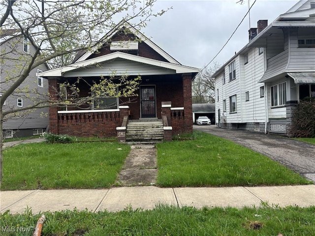 12608 Corlett Ave, Cleveland, OH 44105 - view of front of house featuring brick siding