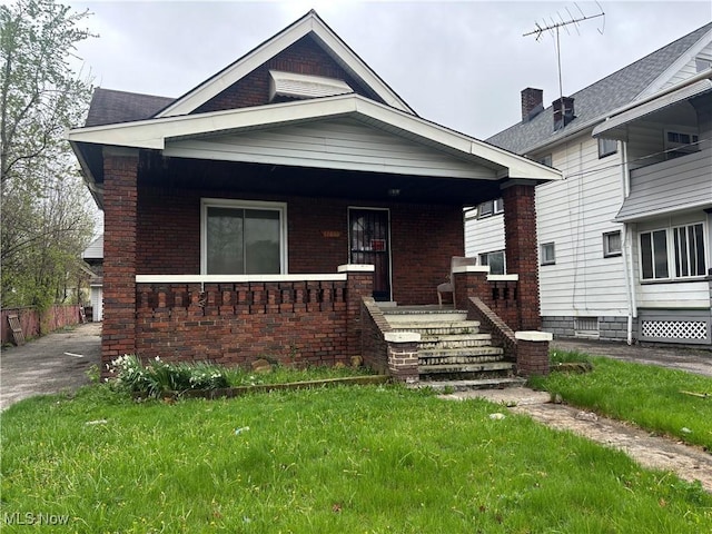 12608 Corlett Ave, Cleveland, OH 44105 - view of front of home with covered porch and brick siding