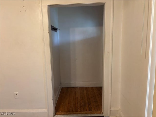 12608 Corlett Ave, Cleveland, OH 44105 - hall with baseboards and wood finished floors