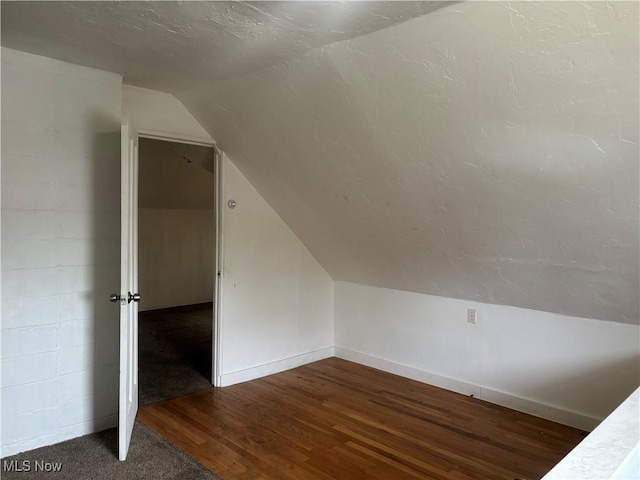 12608 Corlett Ave, Cleveland, OH 44105 - additional living space featuring lofted ceiling, baseboards, and wood finished floors