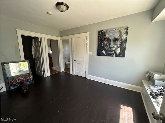 693 E 130th St, Cleveland, OH 44108 - interior space featuring wood finished floors and baseboards
