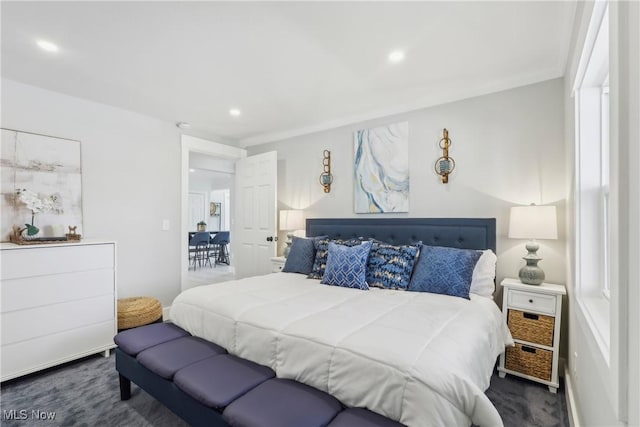 carpeted bedroom with recessed lighting