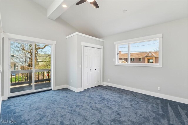 unfurnished bedroom featuring vaulted ceiling with beams, carpet, access to exterior, baseboards, and a ceiling fan