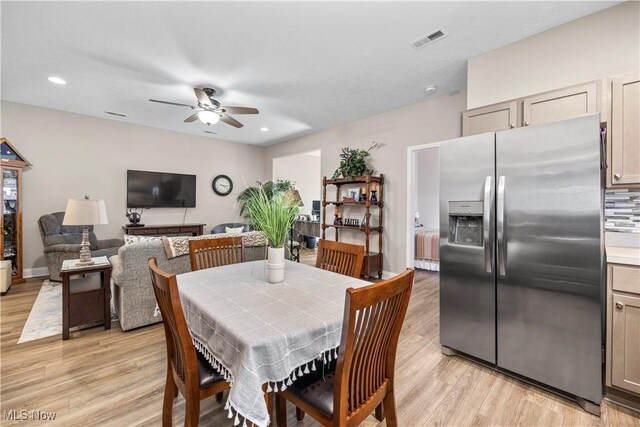 dining room featuring visible vents, a ceiling fan, recessed lighting, and light wood-style floors