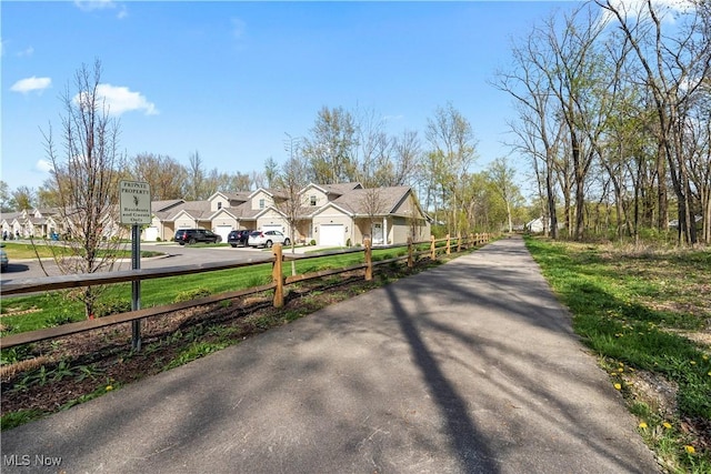 view of road with a residential view