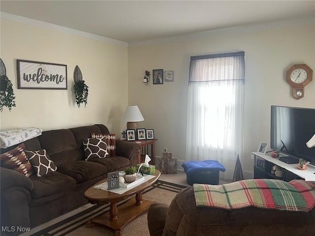 carpeted living room featuring crown molding