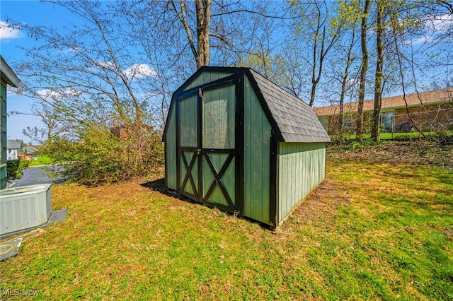 1420 Bridge St, Ashtabula, OH 44004 - view of shed featuring central AC unit