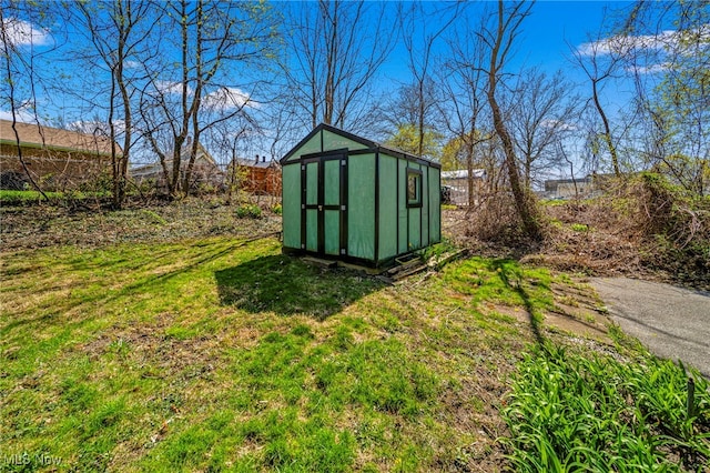 1420 Bridge St, Ashtabula, OH 44004 - view of shed featuring fence